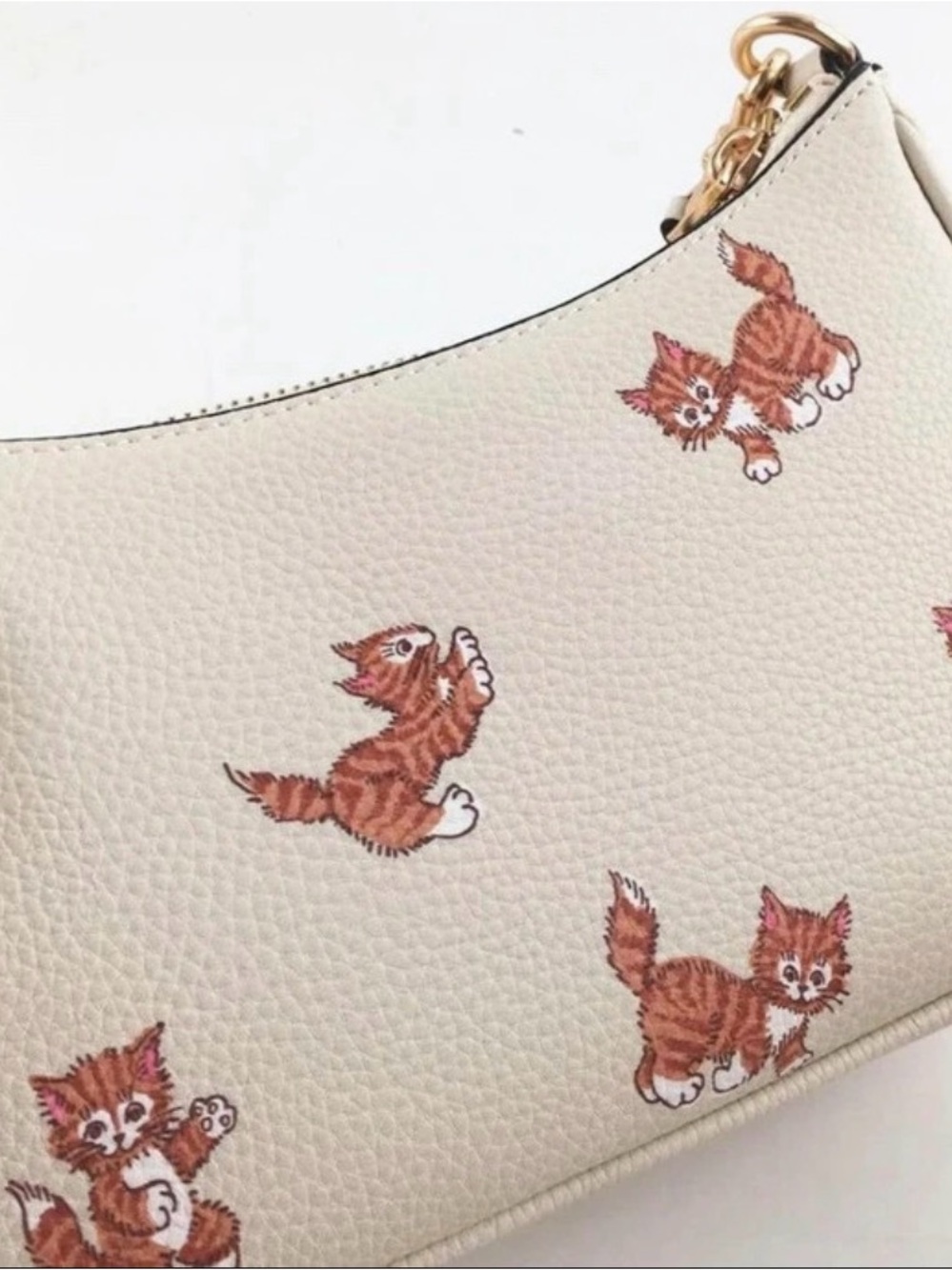 Coach Cream Wristlet with Dancing Kitten Print